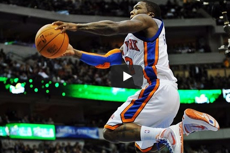 Knicks player Nate Robinson in air during a lay up.